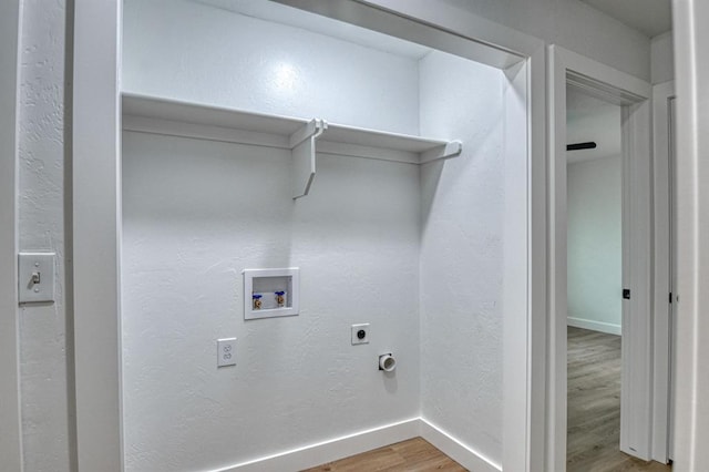 laundry area featuring hookup for an electric dryer, wood-type flooring, and hookup for a washing machine