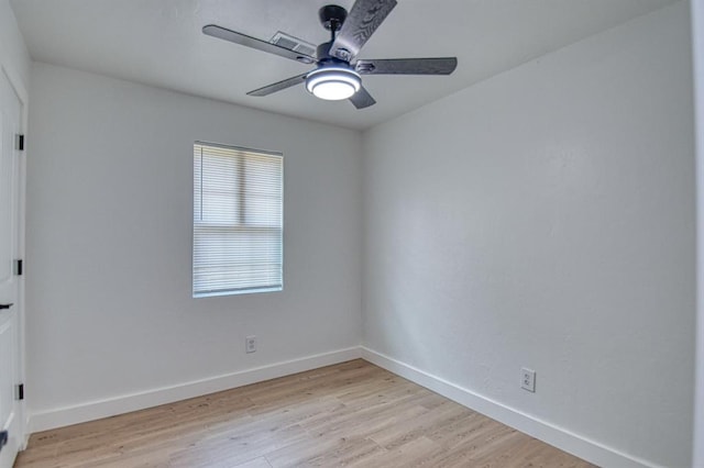 spare room featuring ceiling fan and light wood-type flooring