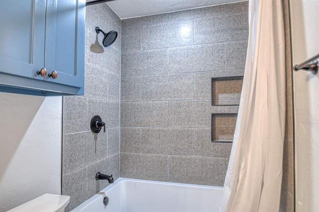 bathroom featuring shower / tub combo with curtain