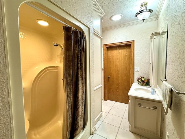 bathroom featuring a shower with curtain, vanity, a textured ceiling, crown molding, and tile patterned flooring