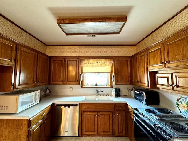 kitchen featuring black range with electric stovetop, dishwasher, and sink