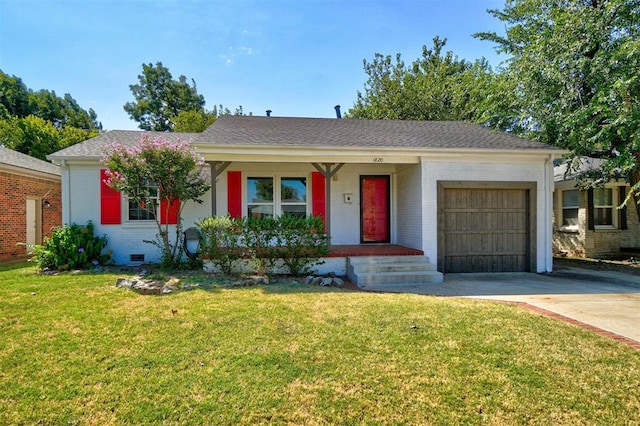 ranch-style home with a front lawn and a garage