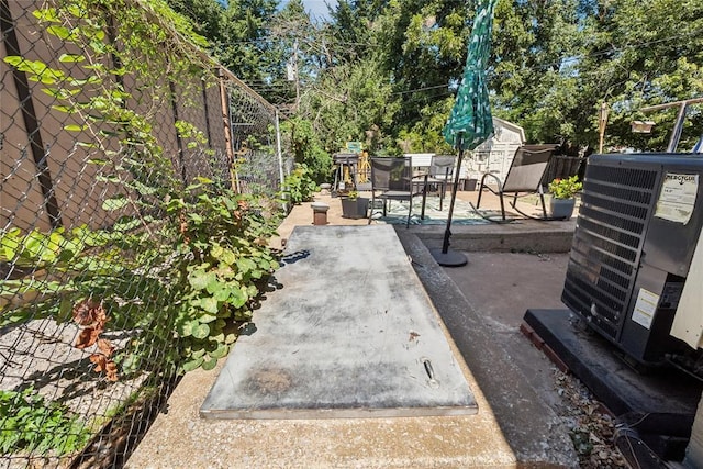 view of patio featuring central air condition unit