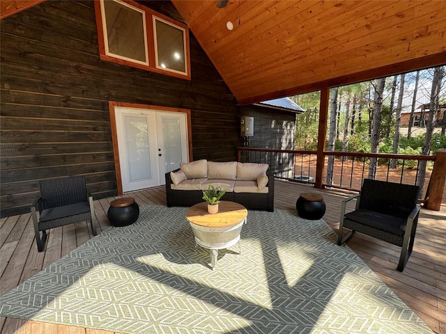 sunroom with french doors, wood ceiling, and lofted ceiling