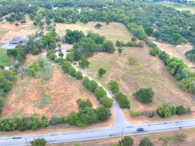 birds eye view of property featuring a rural view