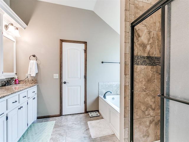 bathroom featuring vanity, plus walk in shower, and vaulted ceiling