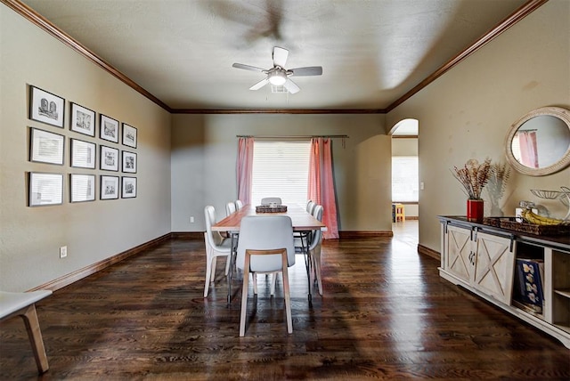 dining space featuring ceiling fan, dark hardwood / wood-style flooring, and ornamental molding