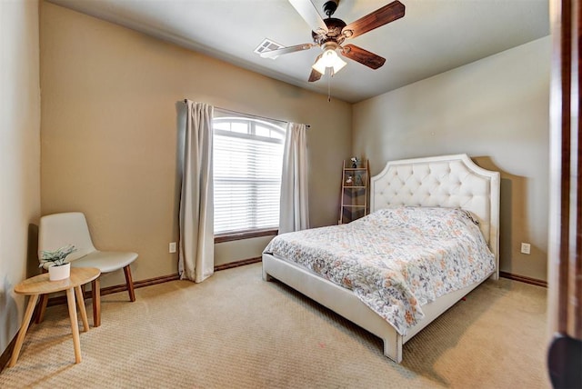 bedroom featuring ceiling fan and light colored carpet