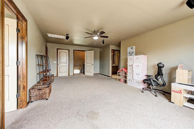 playroom featuring ceiling fan and light colored carpet