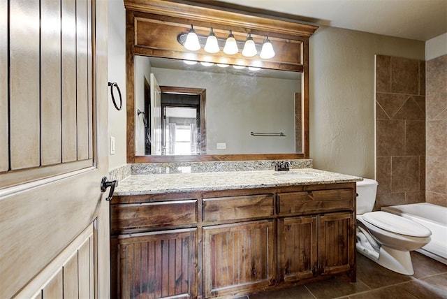 full bathroom with tile patterned flooring, vanity,  shower combination, and toilet