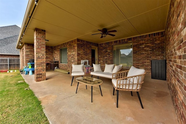 view of patio featuring an outdoor living space and ceiling fan