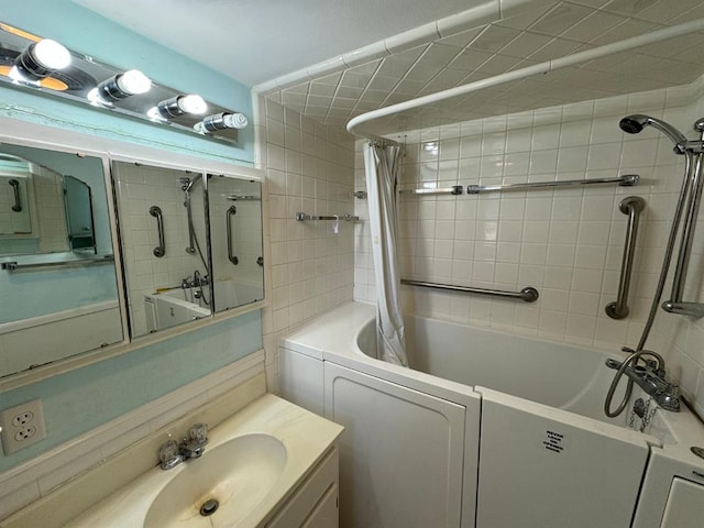 bathroom featuring vanity and shower / tub combo with curtain