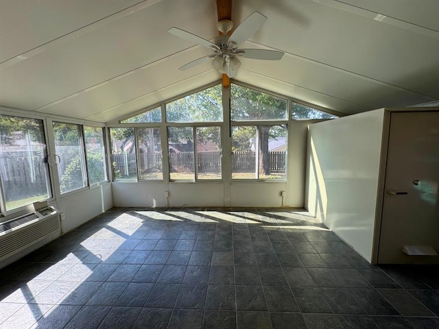 unfurnished sunroom with plenty of natural light, ceiling fan, and lofted ceiling