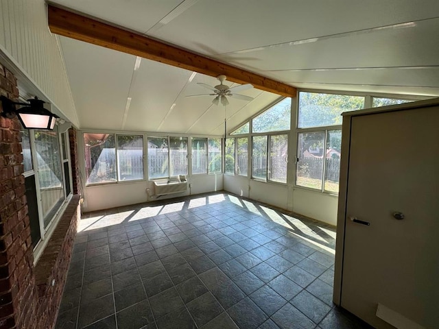 unfurnished sunroom with ceiling fan and lofted ceiling with beams