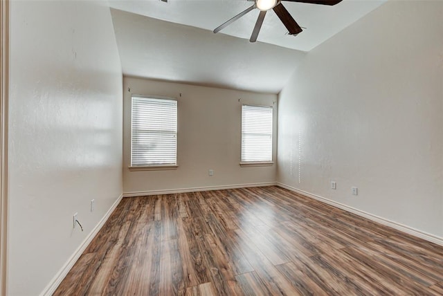 unfurnished room with ceiling fan, dark hardwood / wood-style floors, and lofted ceiling