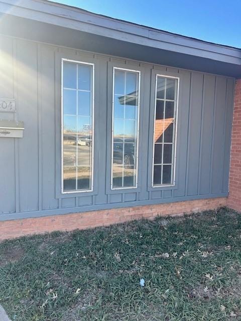 view of side of property with board and batten siding