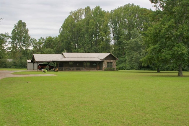 ranch-style home with a front lawn