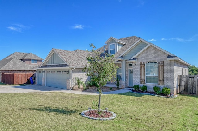 craftsman-style house with a front yard and a garage