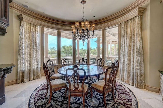 dining space featuring an inviting chandelier, ornamental molding, and light tile patterned flooring