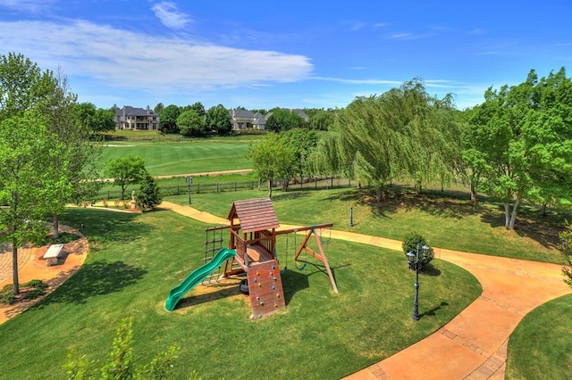 view of jungle gym featuring a yard