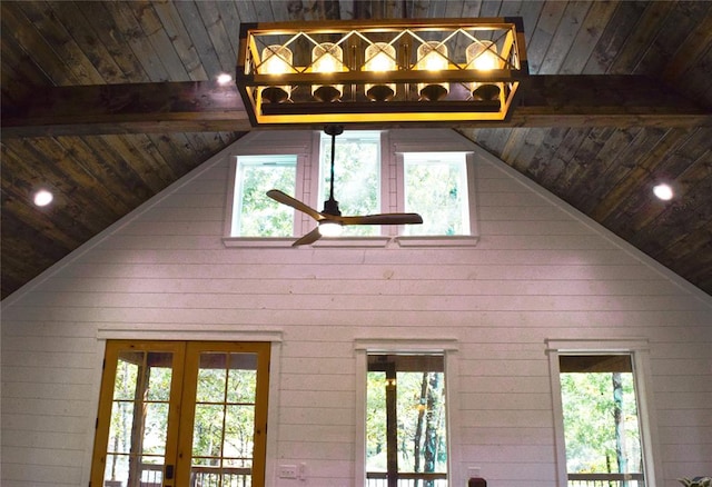 details featuring french doors, wooden ceiling, ceiling fan, and wooden walls