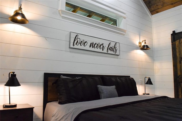 bedroom with lofted ceiling