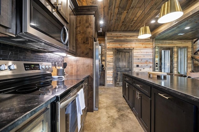 kitchen with dark brown cabinetry, wooden ceiling, pendant lighting, wooden walls, and appliances with stainless steel finishes