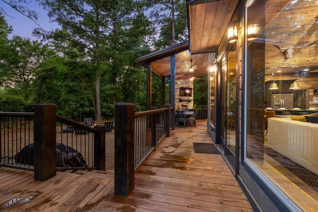 view of deck at dusk