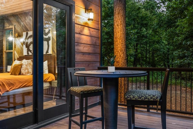 wooden balcony with outdoor lounge area and a deck