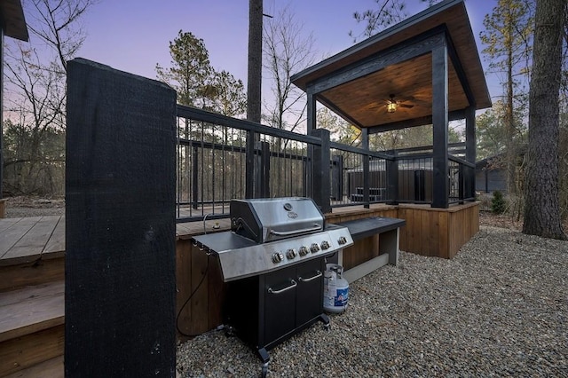 patio terrace at dusk with a grill