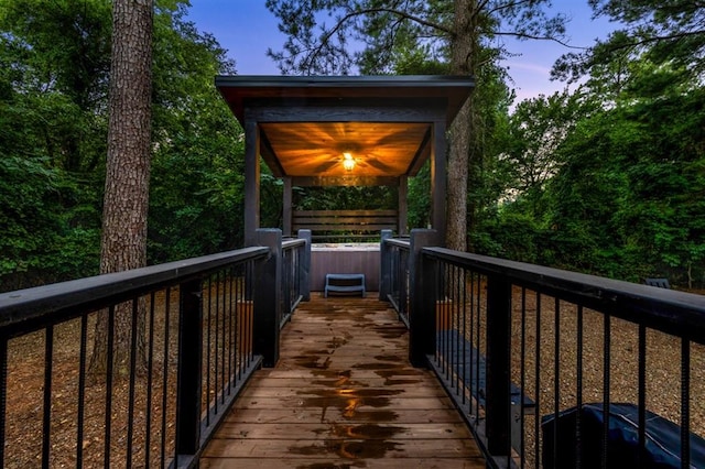 exterior space with ceiling fan