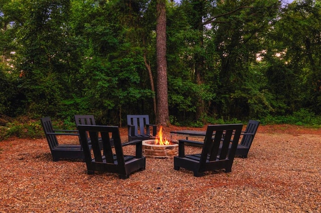 view of patio / terrace featuring an outdoor fire pit