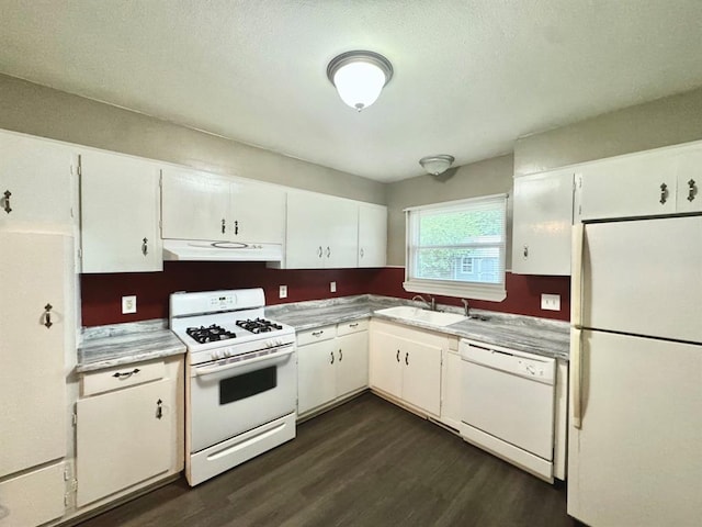 kitchen featuring white cabinetry, white appliances, and sink