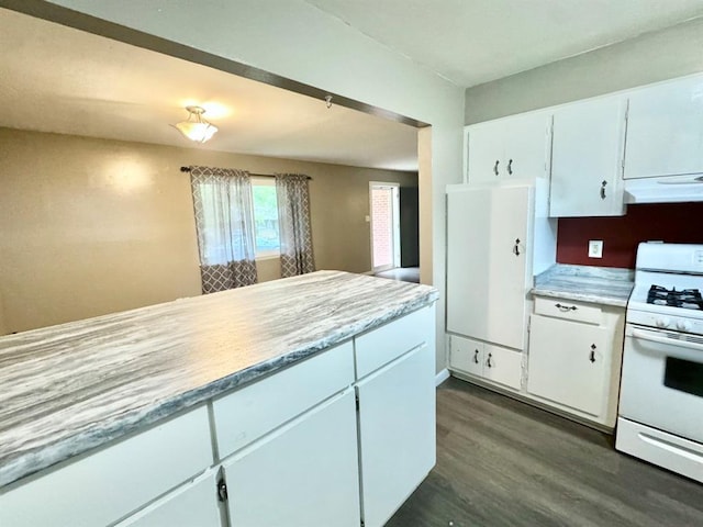 kitchen featuring white cabinetry, dark wood-type flooring, and white stove