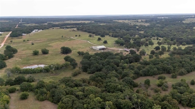 aerial view with a rural view and a water view