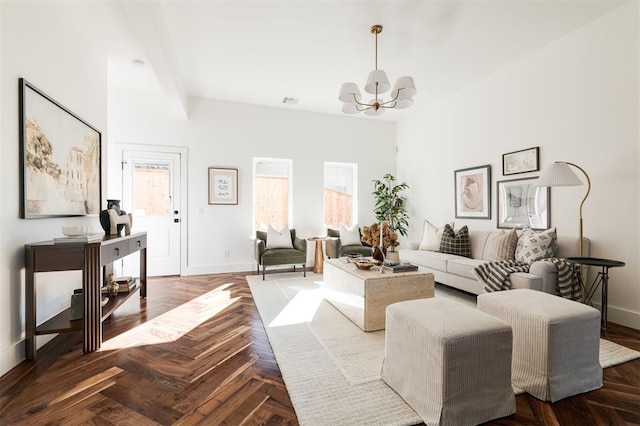 living room featuring a notable chandelier