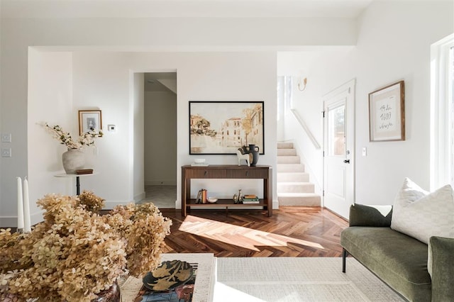 living room featuring parquet flooring