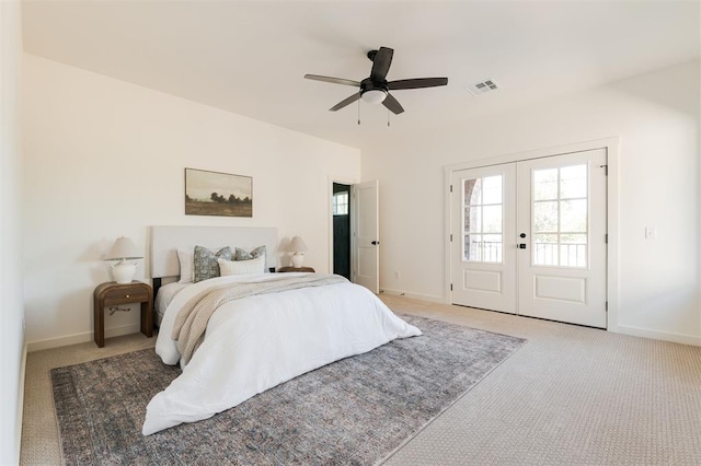 carpeted bedroom featuring french doors, access to outside, and ceiling fan