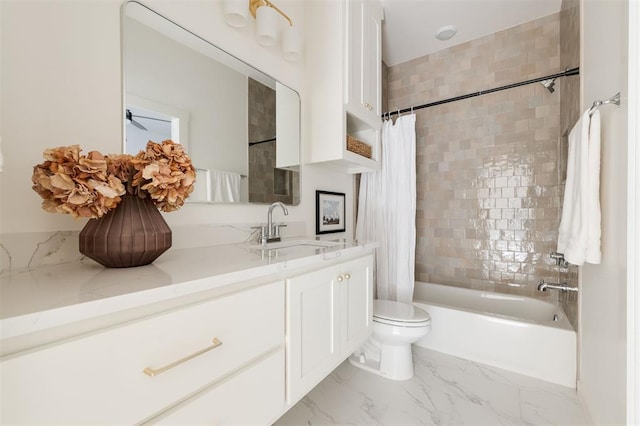 full bathroom with shower / bath combination with curtain, vanity, and toilet