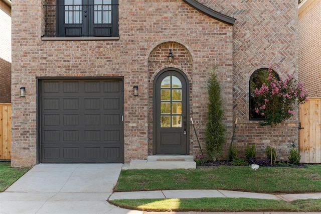 doorway to property with french doors and a garage