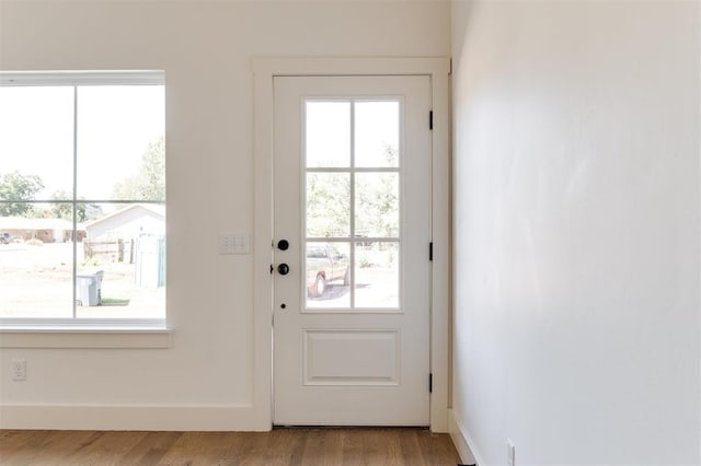 entryway with light hardwood / wood-style floors