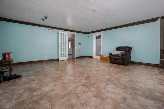 interior space with french doors and ornamental molding