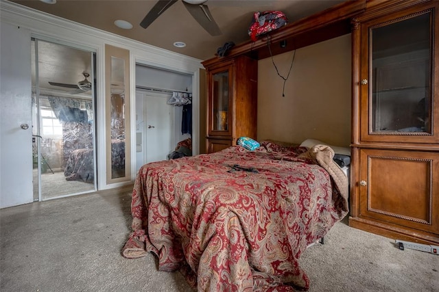 bedroom with ceiling fan and crown molding