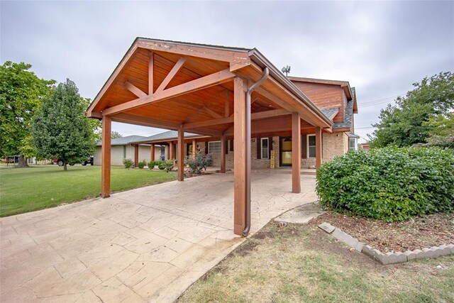 view of patio / terrace featuring a carport