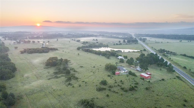 aerial view at dusk with a rural view