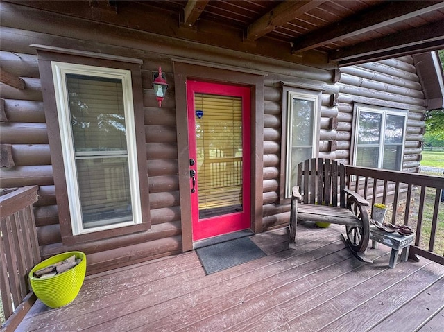 1345 State Highway 1, Hartshorne, OK 74547 - doorway to property featuring a porch and log exterior