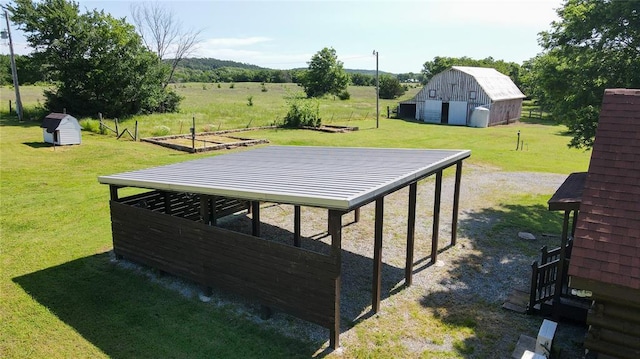 1345 State Highway 1, Hartshorne, OK 74547 - view of grassy yard featuring an outbuilding and a barn