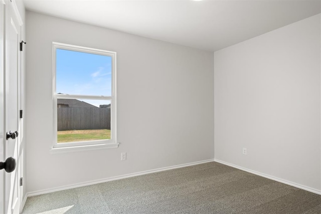 view of carpeted spare room