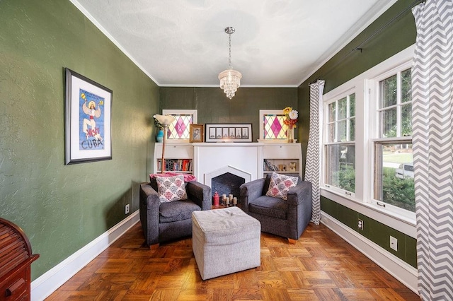 sitting room featuring parquet floors, ornamental molding, and a notable chandelier