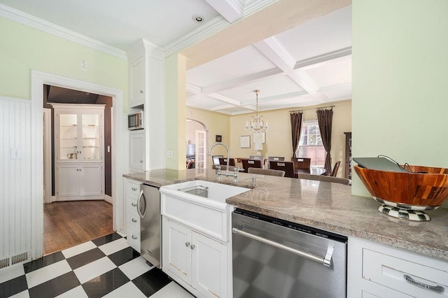 kitchen with white cabinets, coffered ceiling, sink, dishwasher, and dark hardwood / wood-style floors